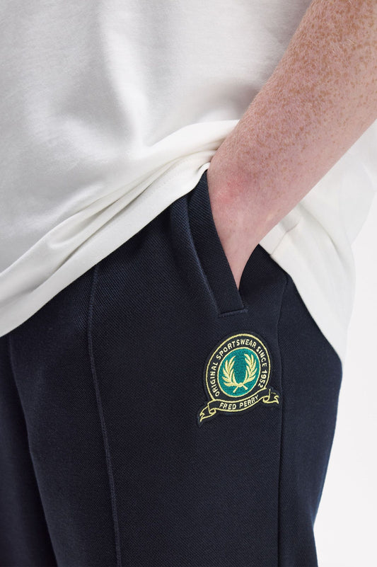FRED PERRY TENNIS BADGE TRACK PANTS