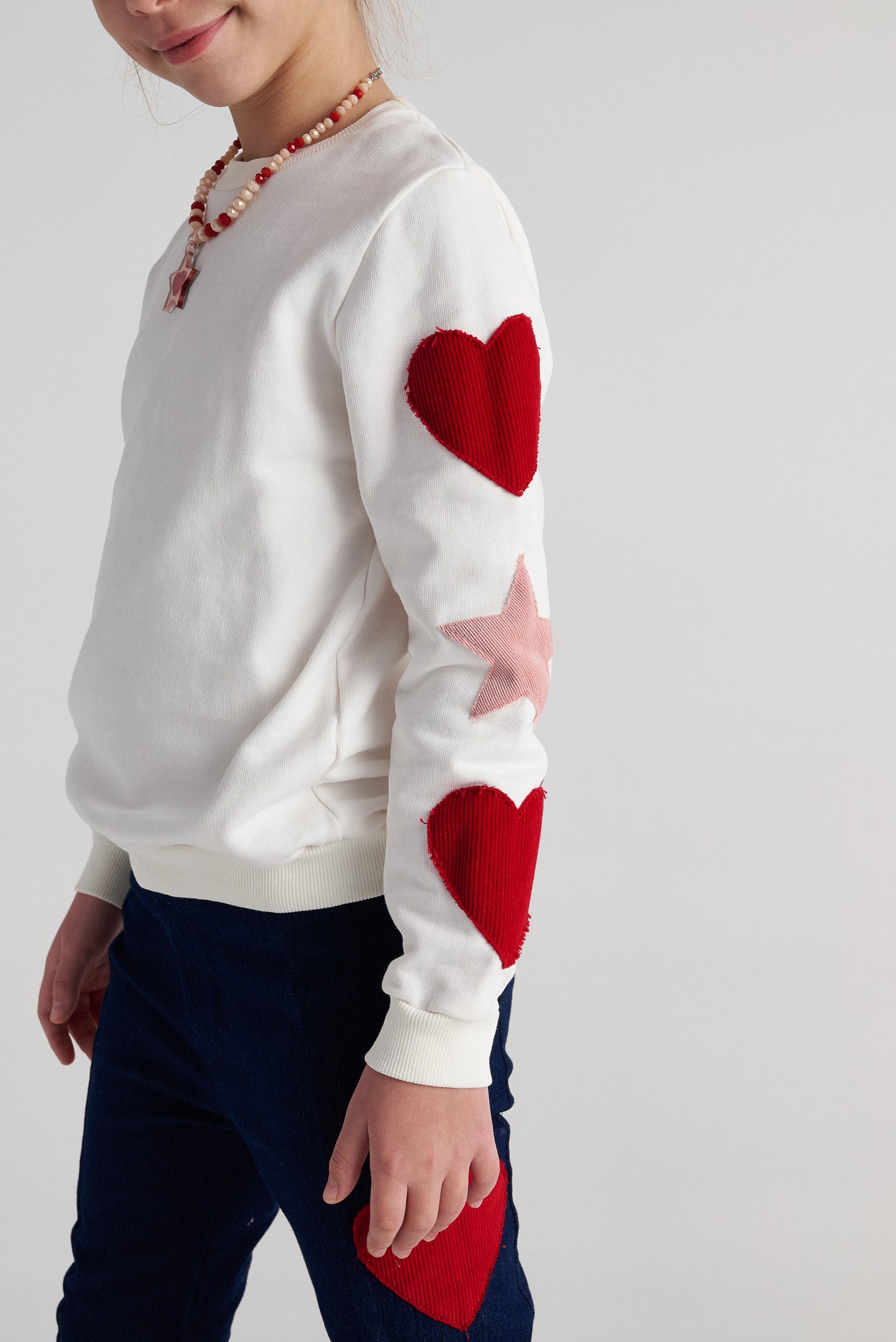 TWO IN A CASTLE GALACTIC HEARTS EMBRIODERED SWEATER TOP