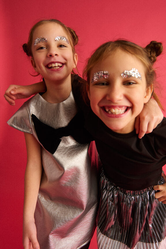 TWO IN A CASTLE METALLICA PLEATHER BOW DRESS