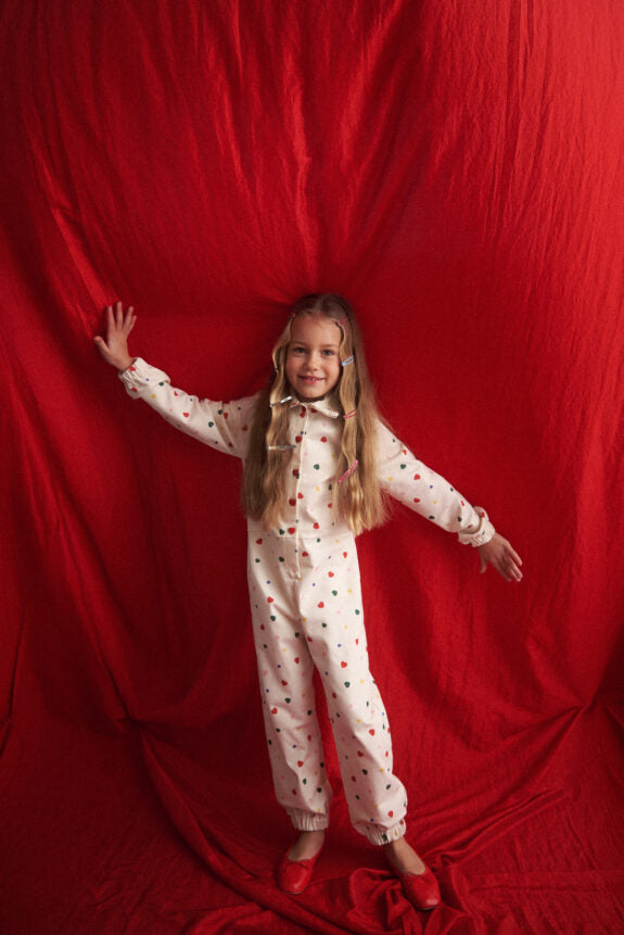 TWO IN A CASTLE HEARTS ALLOVER JUMPSUIT