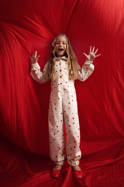 TWO IN A CASTLE HEARTS ALLOVER JUMPSUIT